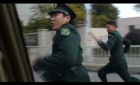 China security officers chase CNN crew