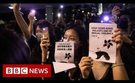 Hong Kong park lights up in sex abuse protest - BBC News